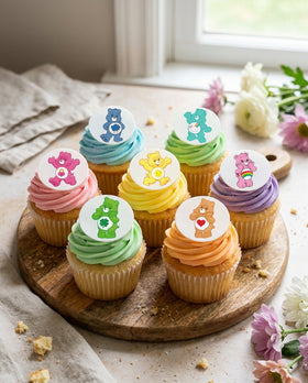 Care Bears edible toppers on group of cupcakes