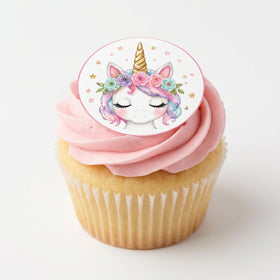 Watercolour unicorn edible topper on pink buttercream cupcake